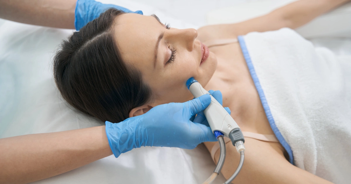 A close-up of a man receiving a jawline injection for Microchanneling in Loveland, CO.