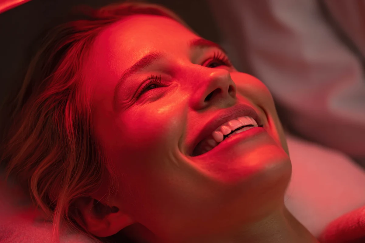 woman receiving red light therapy for mature skin in Loveland CO at EmpowerMed Longevity & Wellness